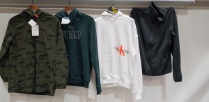 12 X BRAND NEW MIXED CLOTHING LOT CONTAINING THE NORTH FACE GREY FLEECE ZIP UP JUMPER SIZE XS / CALVIN KLEIN WHITE HOODIE SIZE S / PUMA HOODIE IN GREEN SIZE L / ZARA RAIN JACKET IN CAMO SIZE 13 - 14 YRS - ETC