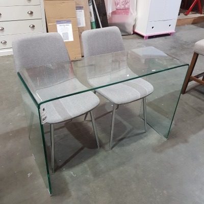 1 X BRAND NEW 1 PIECE CURVED TEMPERED GLASS TABLE ( L 110 CM X W 40 CM X H 77 CM ) - VERY SMALL SCUFFS ON CORNER 2 X BRAND NEW GREY FABRIC CHAIRS