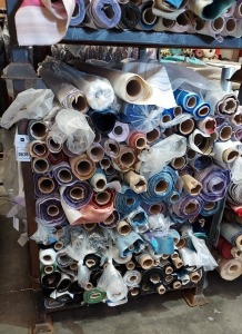 APPROX 150 X PART ROLLS & ENDS OF FABRIC IN VARIOUS COLOURS AND PATTERNS (IN A STILLAGE - NOT INCLUDED)