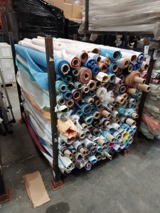 APPROX 150 X PART ROLLS & ENDS OF FABRIC IN VARIOUS COLOURS AND PATTERNS (IN A STILLAGE - NOT INCLUDED)