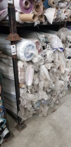 APPROX 150 X PART ROLLS & ENDS OF FABRIC IN VARIOUS COLOURS AND PATTERNS ( IN A STILLAGE - NOT INCLUDED )