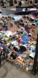 APPROX 150 X PART ROLLS & ENDS OF FABRIC IN VARIOUS COLOURS AND PATTERNS ( IN A STILLAGE - NOT INCLUDED )