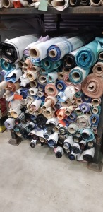 APPROX 150 X PART ROLLS & ENDS OF FABRIC IN VARIOUS COLOURS AND PATTERNS ( IN A STILLAGE - NOT INCLUDED )