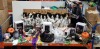 50 X BRAND NEW MIXED HALLOWEEN LOT CONTAINING VARIOUS HALLOWEEN THEMED ITEMS INCLUDING SPOOKY HANGING DOLLS WITH KNIFE'S , 2.1M LIT INFLATABLE HALLOWEEN TRAIN , LED LIGHTS PROJECTOR WITCH AND CAT IMAGES , 2.7M LIT INFLATABLE HAUNTED HOUSE ENTRANCE ETC ON