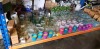 90 X BRAND NEW MIXED PREMIER GARDEN LOT CONTAINING , ARTIFCIAL FLOWERS , LANTERNS , WATERING CANS , PREMIER GLASS COCKTAIL GIFT SETS , GLASS CANDLE HOLDERS , HANGING GLASS JARS , GLASS LANTERN ETC (LOAD 7 PALLET 18 )