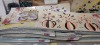 2000+ PIECE BRAND NEW MIXED LOT CONTAINING LARGE AMOUNT OF VARIOUS LUMINOUS GLASS STICKERS / CUP CAKE SET / ROUND AND WAVY EDGE EDGE SIDED CUTTER SET / ZHENYA PENCIL CASES / PAPER CANDY BAGS / VARIOUS PENCIL BOXES ETC - ON A FULL BAY - 2