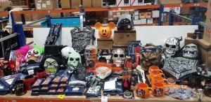 250 PIECE MIXED HALLOWEEN LOT CONTAINING SKULL MASK'S DELUXE PUMPKIN CARVING KITS, KIDS CAPE , DISNEY LIGHT UP JARS , DISNEY HALLOWEEN MUGS , GIANT SPIDER WEBS ETC ON A FULL BAY.