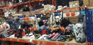 250 PIECE MIXED HALLOWEEN LOT CONTAINING BURIED ALIVE SKELETON BONES , SPOOKY SPIDER , PUMPKIN PARTY KIT , DISNEY MUGS , DECORATIVE R I P TOMBSTONES , HANGING HELLO PUMPKIN CANVAS ETC ON A FULL BAY.