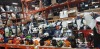 250 PIECE MIXED HALLOWEEN LOT CONTAINING ANIMATED SPOOKY SCARECROW 6 FOOT , BURIED ALIVE SKELETON BONE , SINISTER SKULL CANDY BOWL , HORRIFYING HAMMERS , PUMPKIN CARVING KIT ETC ON A FULL BAY.