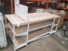 1 X BAY TABLE WITH 2 TIER UNDER SHELVING WOOD BOARDS (0.95m H x 2.22m L x 0.95m W) LOT SELLING UNIT IS ALL THAT YOU SEE IN THE IMAGE