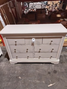 1 X MABEL 7 DRAWER TALL CHEST IN TAUPE 124 X 46 X 86CM (PLEASE NOTE CUSTOMER RETURNS)