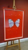 DAMIEN HIRST PRINT UNTITLED: SINGLE BUTTERFLY ON RED BACKGROUND RED FRAME SIZE: H 99.5CM X W 66CM EXCLUDING FRAME AND MOUNT DAMIEN HIRST PRINT