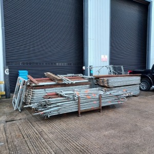 LARGE SELECTION OF LAYHER SCAFFOLDING TO INC - APPROX 124 X SYSTEM DECKS, 40 X TOE BOARDS, 40 X FRAMES AND 50 X BARS WITH VARIOUS FITTINGS ATTACHED.